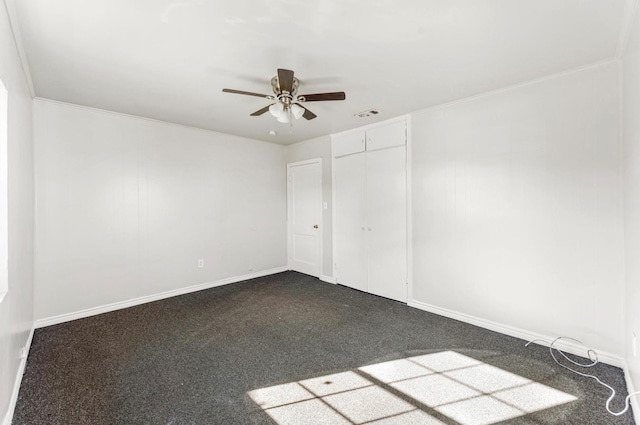 4637 Carmen St, Houston, TX 77051 - unfurnished bedroom featuring a ceiling fan, a closet, and dark carpet