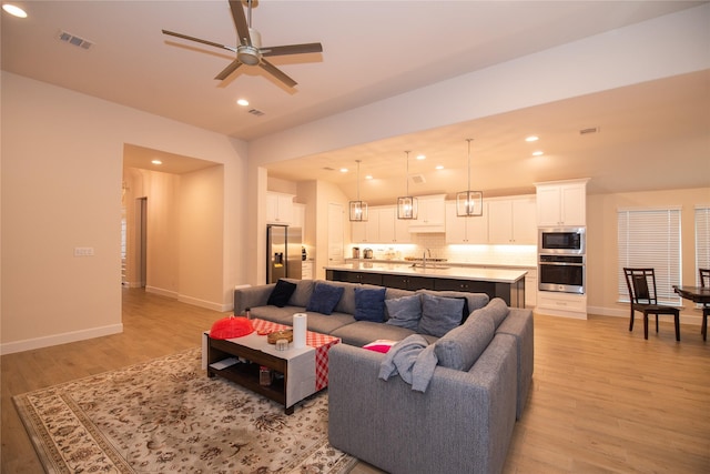 19211 Belmont Stakes Way, Tomball, TX 77377 - living room with recessed lighting, light wood-style floors, and ceiling fan