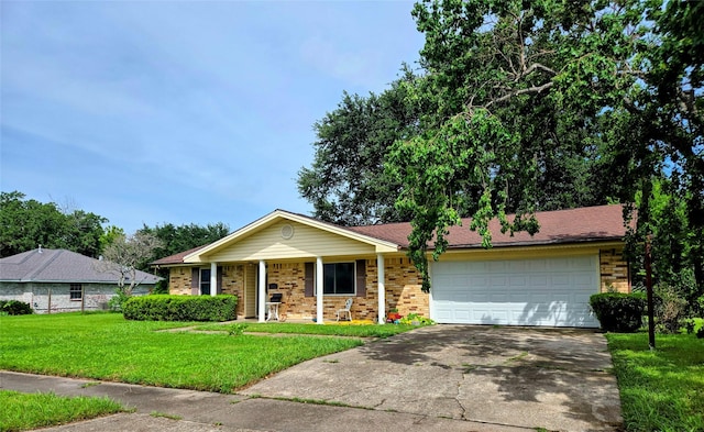 700 W 19th St, Port Arthur, TX 77640 - ranch-style home with a garage, concrete driveway, a front lawn, covered porch, and brick siding