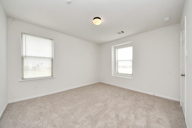 2702 Urban Glen Ct, Houston, TX 77038 - spare room featuring carpet flooring and a smoke detector