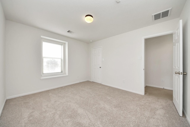 2702 Urban Glen Ct, Houston, TX 77038 - empty room featuring light carpet and baseboards