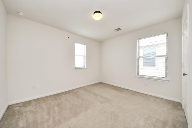 2702 Urban Glen Ct, Houston, TX 77038 - unfurnished room featuring light carpet and a smoke detector