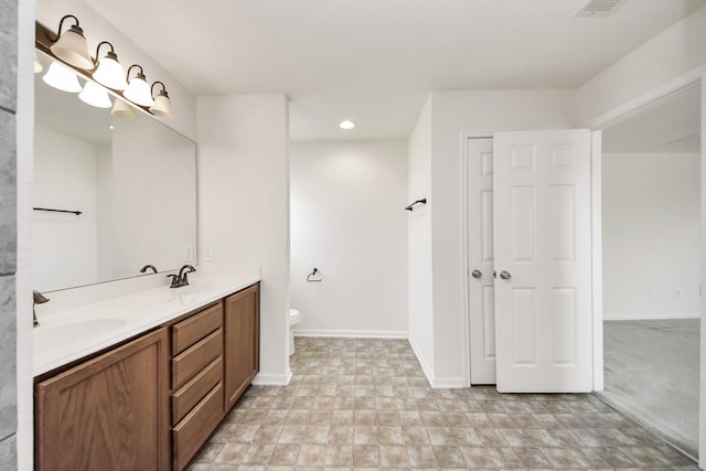 2702 Urban Glen Ct, Houston, TX 77038 - full bathroom with double vanity and recessed lighting