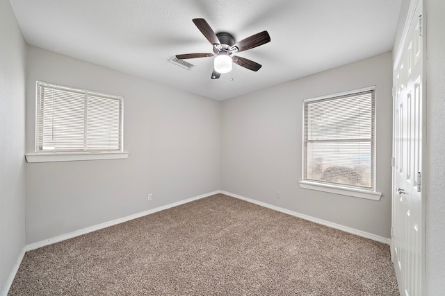 7421 Parker Rd, Houston, TX 77016 - empty room featuring carpet and ceiling fan