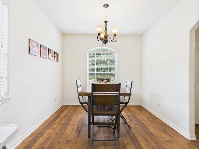 9439 Amethyst Glen Dr, Rosharon, TX 77583 - dining area featuring a chandelier and hardwood / wood-style floors