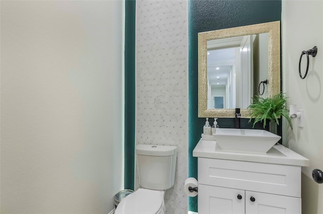 25142 W Tara Plantation Dr, Tomball, TX 77375 - half bathroom featuring vanity and toilet
