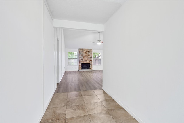 2730 Mesquite Dr, Sugar Land, TX 77479 - hallway with baseboards and vaulted ceiling