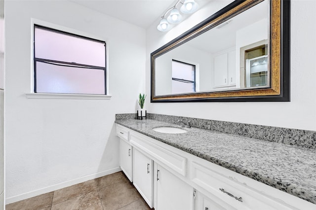 2730 Mesquite Dr, Sugar Land, TX 77479 - bathroom with vanity and baseboards