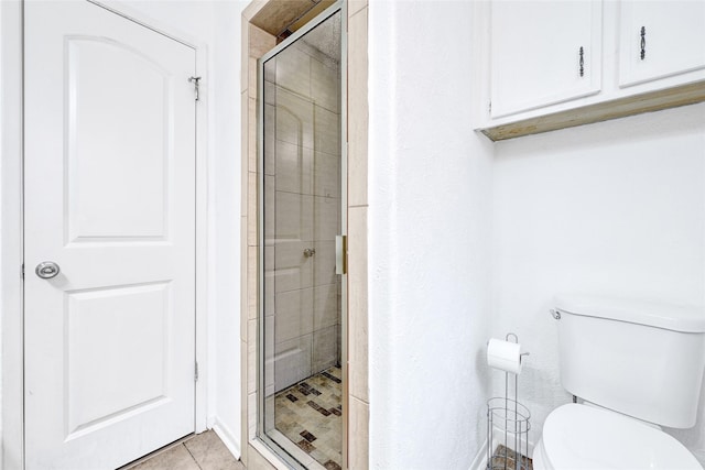 2730 Mesquite Dr, Sugar Land, TX 77479 - bathroom featuring a shower stall and tile patterned flooring