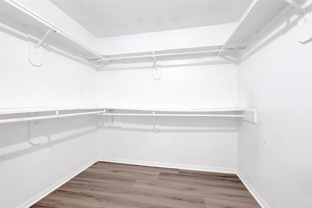 2730 Mesquite Dr, Sugar Land, TX 77479 - spacious closet featuring wood finished floors