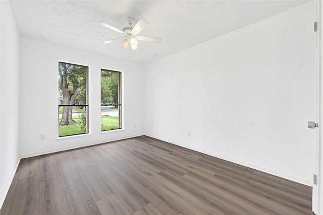 2730 Mesquite Dr, Sugar Land, TX 77479 - spare room with wood finished floors and a ceiling fan