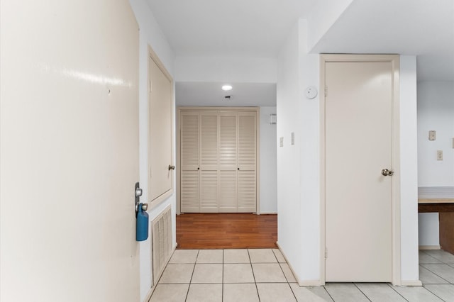 14555 Wunderlich Dr Unit 2602, Houston, TX 77069 - hallway featuring light tile patterned floors and baseboards
