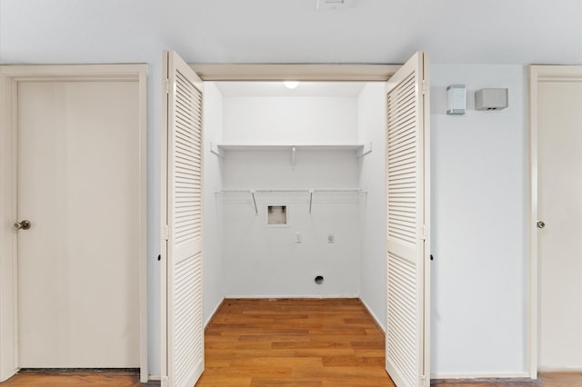 14555 Wunderlich Dr Unit 2602, Houston, TX 77069 - laundry room with washer hookup and light wood-style floors