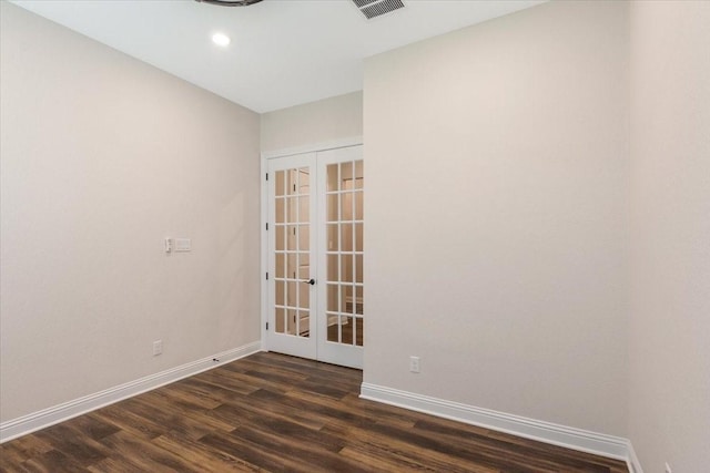 23 N Wheatleigh Dr, Tomball, TX 77375 - empty room with french doors, dark wood finished floors, and recessed lighting