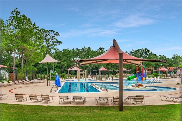 23 N Wheatleigh Dr, Tomball, TX 77375 - community pool with a water play area