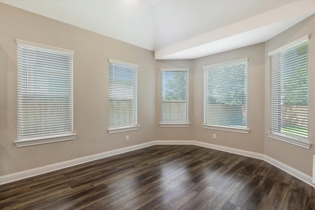 23 N Wheatleigh Dr, Tomball, TX 77375 - spare room with dark wood-type flooring and baseboards