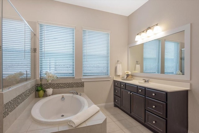 23 N Wheatleigh Dr, Tomball, TX 77375 - full bathroom with vanity, a garden tub, and tile patterned floors