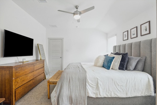 12717 Ermine St, Houston, TX 77047 - carpeted bedroom featuring vaulted ceiling and a ceiling fan