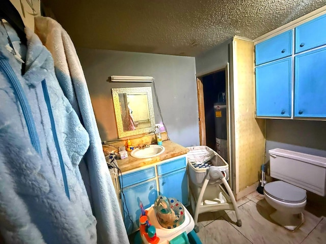 833 N Ave G, Odessa, TX 79763 - bathroom with vanity and a textured ceiling