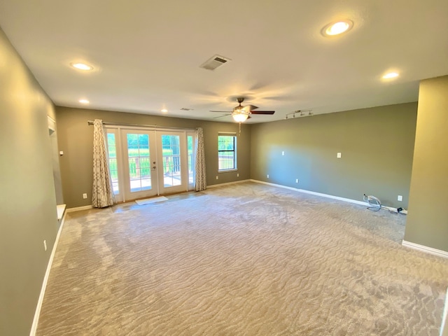 328 Mcguire Rd, Lufkin, TX 75901 - spare room featuring french doors, ceiling fan, recessed lighting, and carpet floors