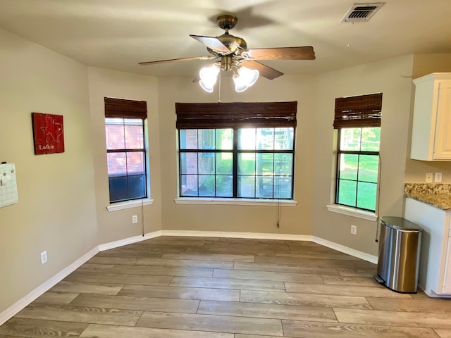 328 Mcguire Rd, Lufkin, TX 75901 - unfurnished dining area featuring a ceiling fan and light wood finished floors