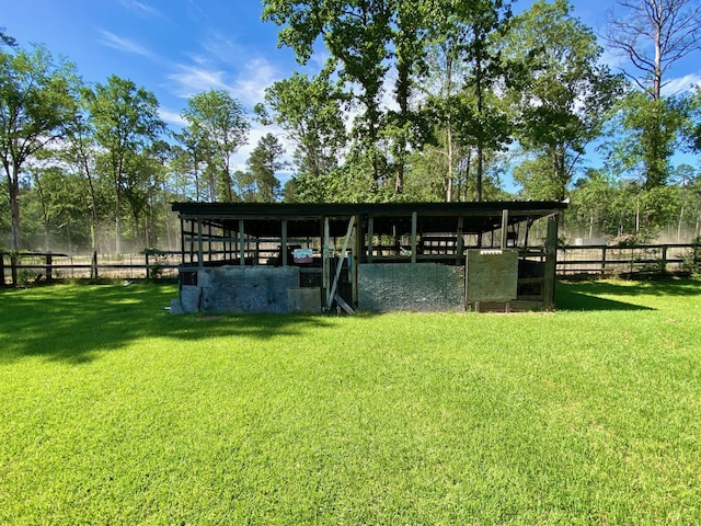 328 Mcguire Rd, Lufkin, TX 75901 - view of yard with an exterior structure and an outbuilding