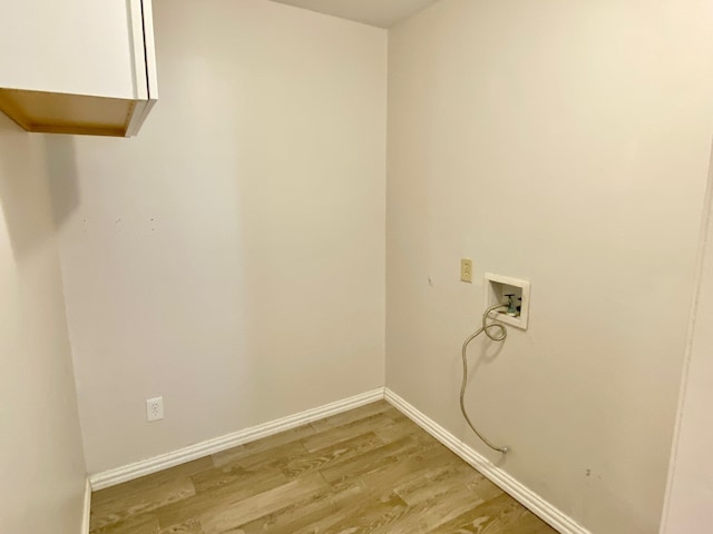 328 Mcguire Rd, Lufkin, TX 75901 - washroom featuring hookup for a washing machine and light wood finished floors