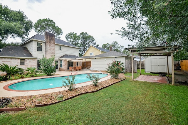 22410 Bucktrout Ln, Katy, TX 77449 - view of swimming pool featuring a shed, a fenced backyard, and a patio area