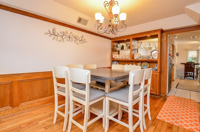 22410 Bucktrout Ln, Katy, TX 77449 - dining room featuring light wood-style flooring and a chandelier