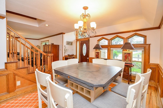 22410 Bucktrout Ln, Katy, TX 77449 - dining area featuring light wood-style floors, a wainscoted wall, a chandelier, ornamental molding, and recessed lighting