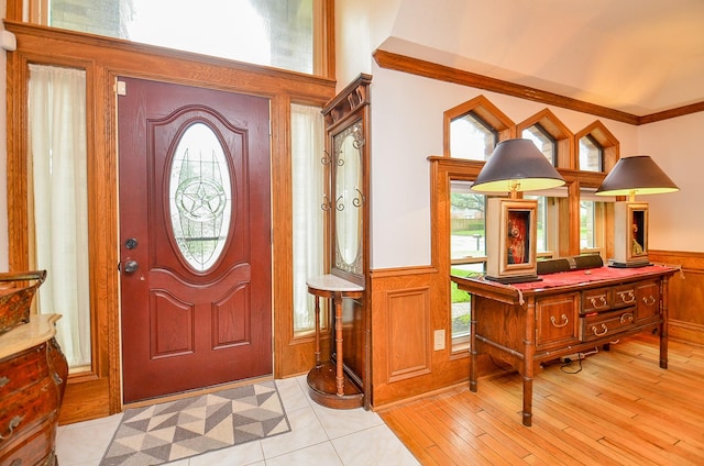 22410 Bucktrout Ln, Katy, TX 77449 - foyer with a wainscoted wall, light wood-type flooring, and ornamental molding