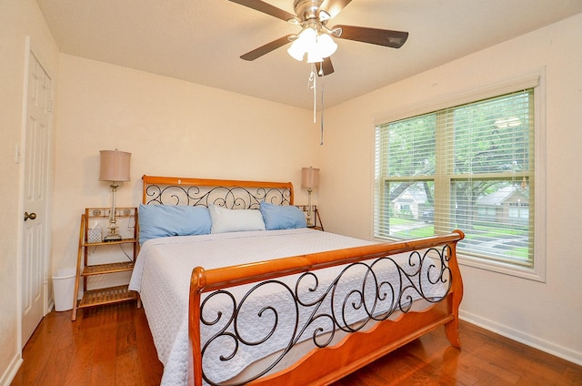 22410 Bucktrout Ln, Katy, TX 77449 - bedroom with wood finished floors and a ceiling fan