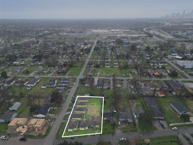 3938 King St, Houston, TX 77026 - aerial overview of property's location with property parcel outlined and nearby suburban area