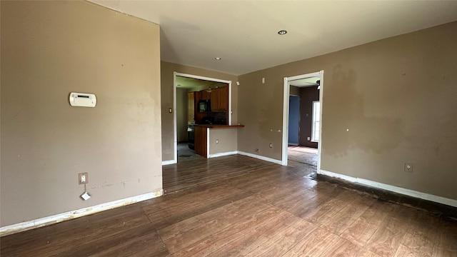 7338 Hurtgen Forest Rd, Houston, TX 77033 - empty room featuring wood finished floors and baseboards