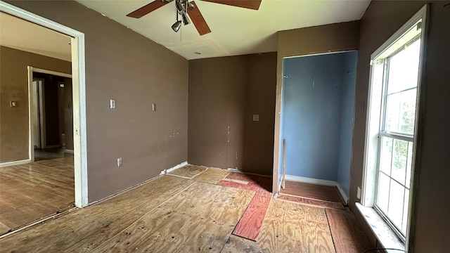 7338 Hurtgen Forest Rd, Houston, TX 77033 - unfurnished bedroom featuring wood finished floors, ceiling fan, and a closet