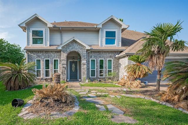 606 Oak Hill Dr, Kemah, TX 77565 - view of front of house featuring roof with shingles