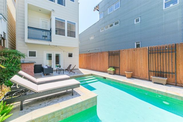 701 Asbury St, Houston, TX 77007 - view of swimming pool featuring french doors