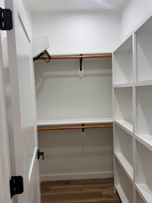 6206 Lyndhurst Dr, Houston, TX 77087 - walk in closet featuring dark wood-style flooring