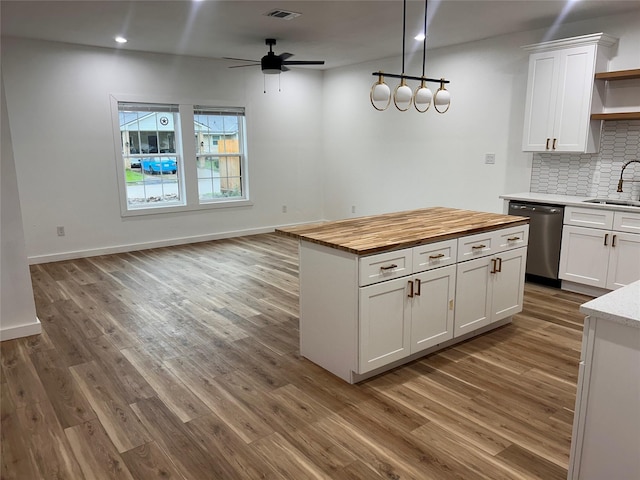 6206 Lyndhurst Dr, Houston, TX 77087 - kitchen featuring dishwasher, open shelves, wooden counters, a ceiling fan, and backsplash