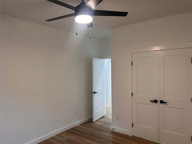 6206 Lyndhurst Dr, Houston, TX 77087 - unfurnished bedroom featuring wood finished floors, ceiling fan, and a closet