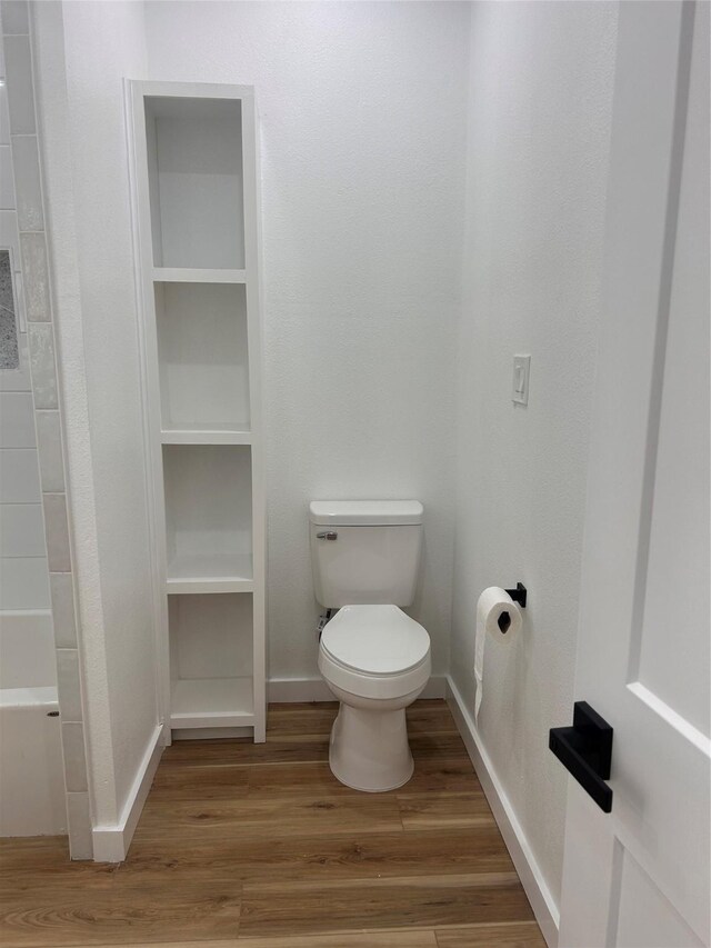 6206 Lyndhurst Dr, Houston, TX 77087 - bathroom featuring toilet and wood finished floors