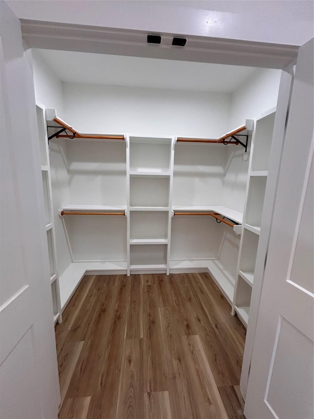 6206 Lyndhurst Dr, Houston, TX 77087 - walk in closet featuring wood finished floors