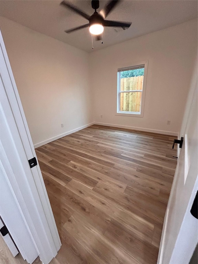 6206 Lyndhurst Dr, Houston, TX 77087 - empty room with wood finished floors and ceiling fan