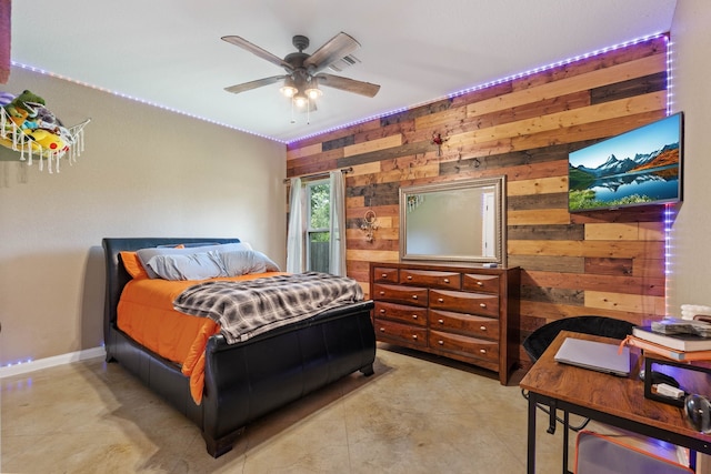 806 Garrett Dr, Magnolia, TX 77354 - bedroom with wood walls and ceiling fan