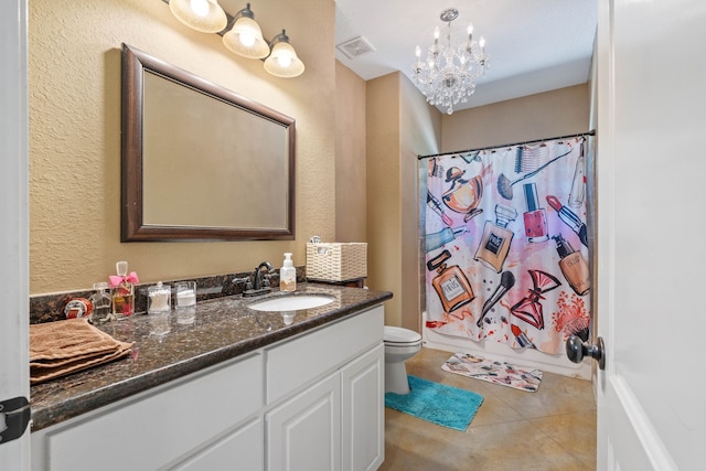806 Garrett Dr, Magnolia, TX 77354 - full bath with vanity, tile patterned floors, and a chandelier