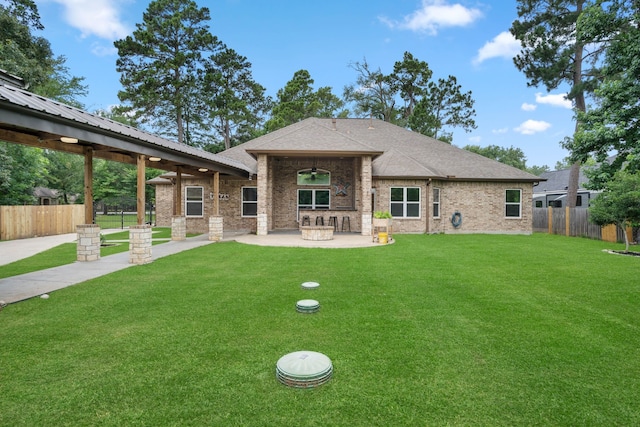 806 Garrett Dr, Magnolia, TX 77354 - back of property with a ceiling fan, a patio, brick siding, and roof with shingles