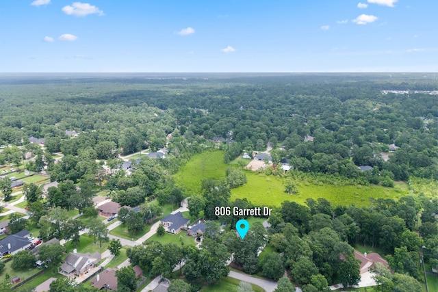 806 Garrett Dr, Magnolia, TX 77354 - aerial view of property's location with a forest and nearby suburban area