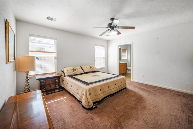 2630 Skyview Crest Ct, Houston, TX 77047 - bedroom with light carpet, connected bathroom, and a ceiling fan
