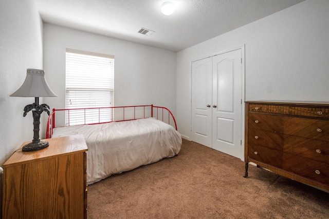 2630 Skyview Crest Ct, Houston, TX 77047 - carpeted bedroom with a closet