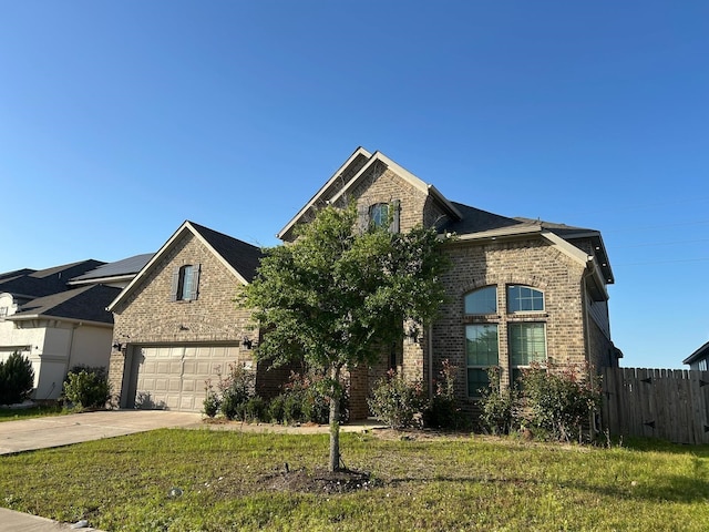 18542 Twilight Arbor Trl, Richmond, TX 77407 - view of front of property with brick siding, driveway, and a garage